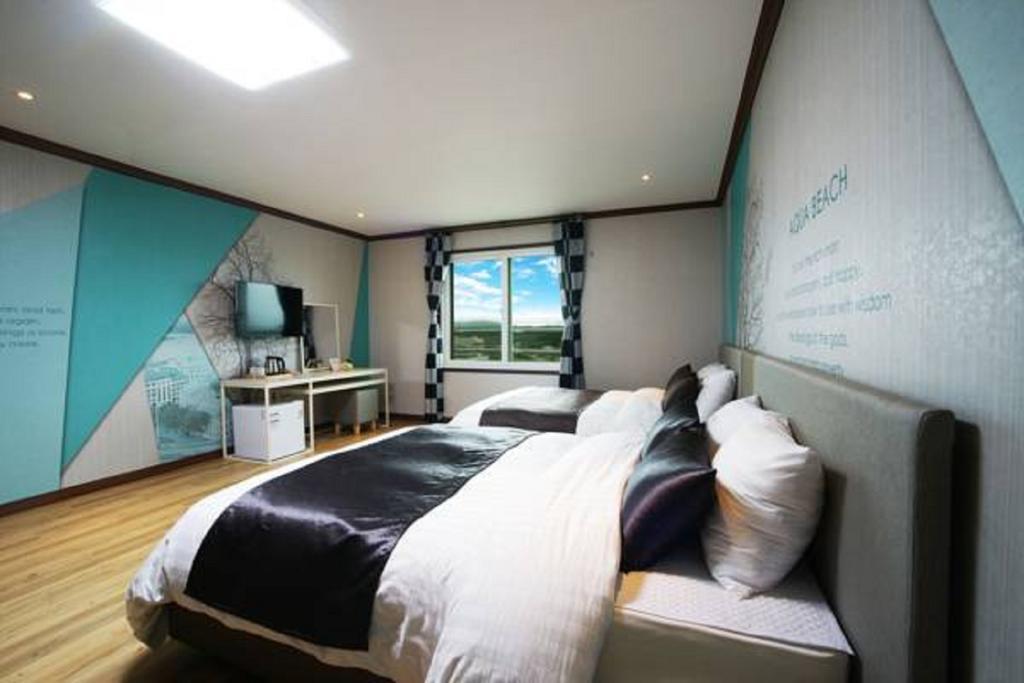 Seongsan Aqua Beach Hotel Seogwipo Quarto foto