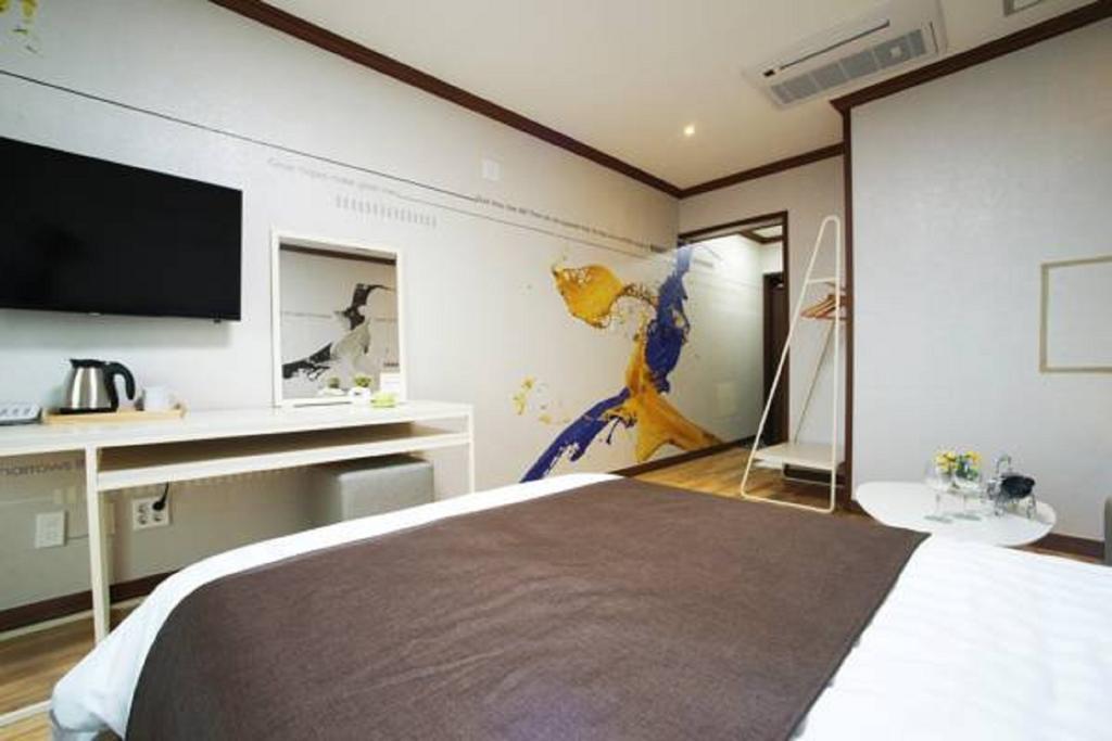 Seongsan Aqua Beach Hotel Seogwipo Quarto foto